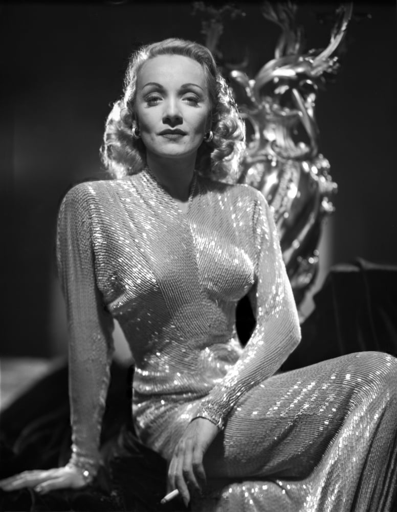 Marlene Dietrich portrait wearing a glossy dress photo print.