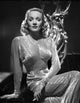Marlene Dietrich portrait wearing a glossy dress photo print.