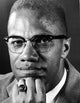 Close-up photo print of Malcolm X, capturing his powerful presence.