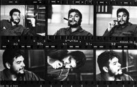 Che Guevara smoking a cigar photo print, iconic revolutionary image.