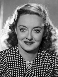 Bette Davis portrait in white polka dot black silk blouse photo print.