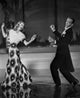 Fred Astaire and Ginger Rogers dancing photo print, capturing their joyful moment.