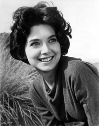 Suzanne Pleshette wearing a long sleeve blouse on grass photo print