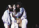 The Bee Gees live performance photo print showcasing their stage presence.