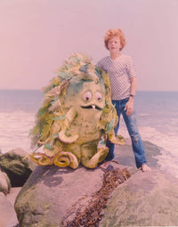 Sigmund and the Sea Monster movie scene photo print featuring characters standing on a rock in the sea.