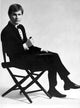 Bobby Rydell sitting in a tuxedo photo print, classic music icon.
