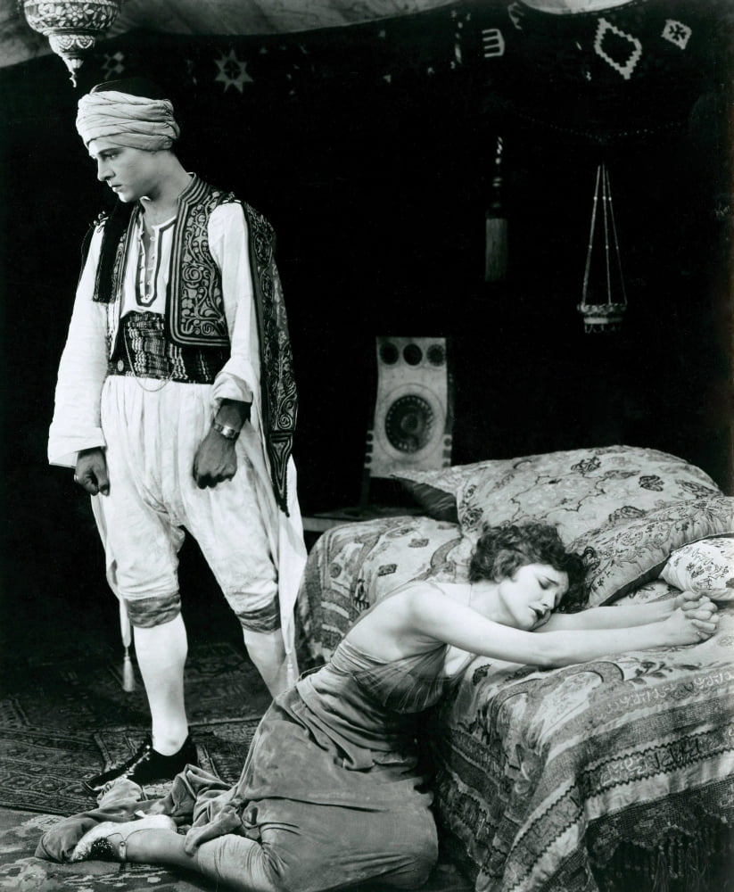 The Sheik movie poster print featuring Rudolph Valentino and Agnes Ayres.