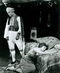 The Sheik movie poster print featuring Rudolph Valentino and Agnes Ayres.