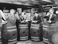 Marx Brothers scene photograph print featuring four men hiding in a barrel.