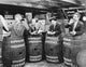 Marx Brothers scene photograph print featuring four men hiding in a barrel.