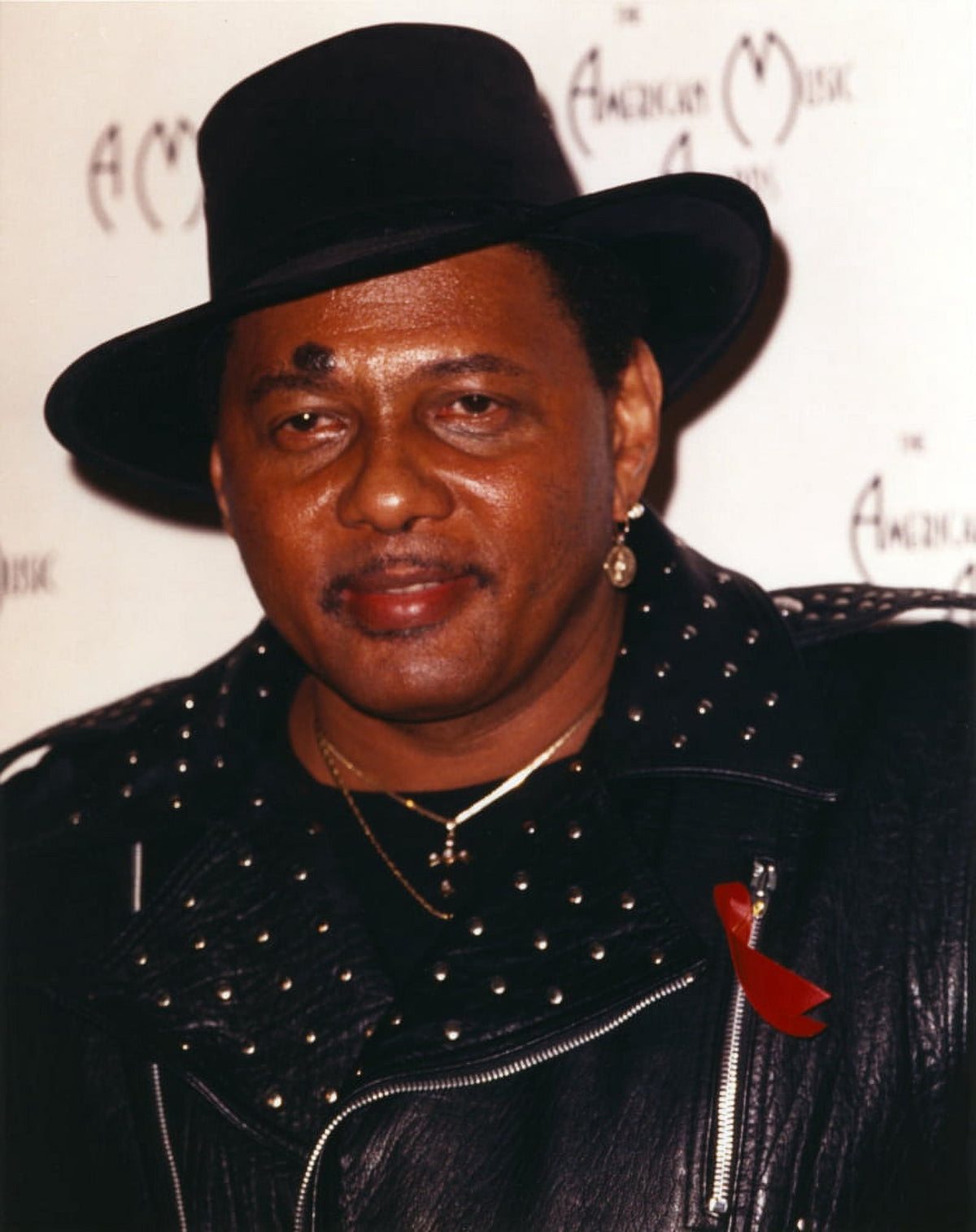 Aaron Neville portrait photo print in black jacket and hat