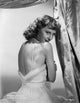 Barbara Stanwyck classic portrait photo print in a backless dress.