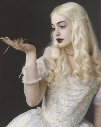 Anne Hathaway photo print posed with a mouse, vibrant and charming.