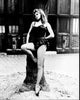 Brigitte Bardot leaning on a tree in fishnets black and white photo print