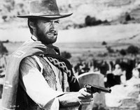 Clint Eastwood posed in cowboy attire with pistol photo print