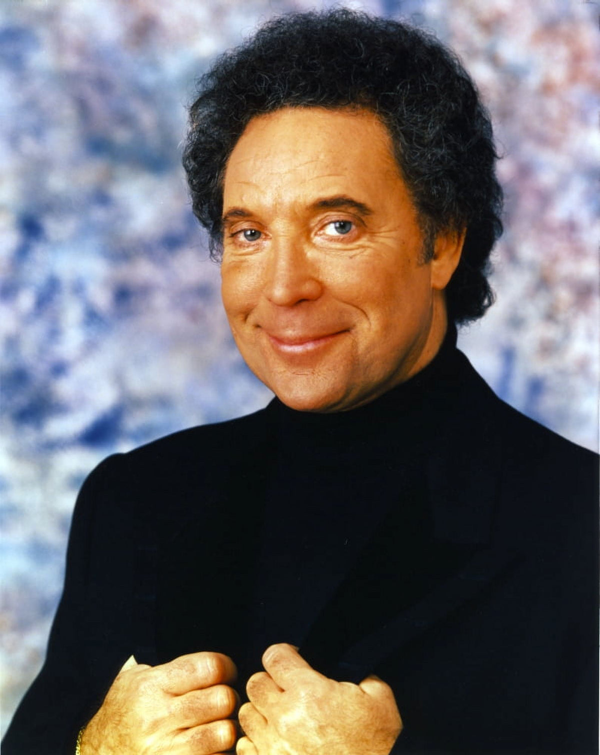 Tom Jones iconic performance photo print in black suit.