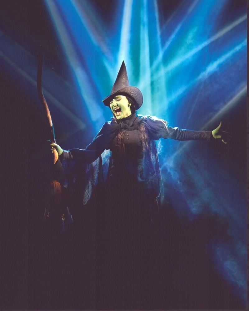 Idina Menzel performing on stage in Wicked photo print.