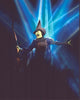 Idina Menzel performing on stage in Wicked photo print.