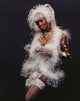 Vivica Fox elegant portrait photo print in feather dress on black background.