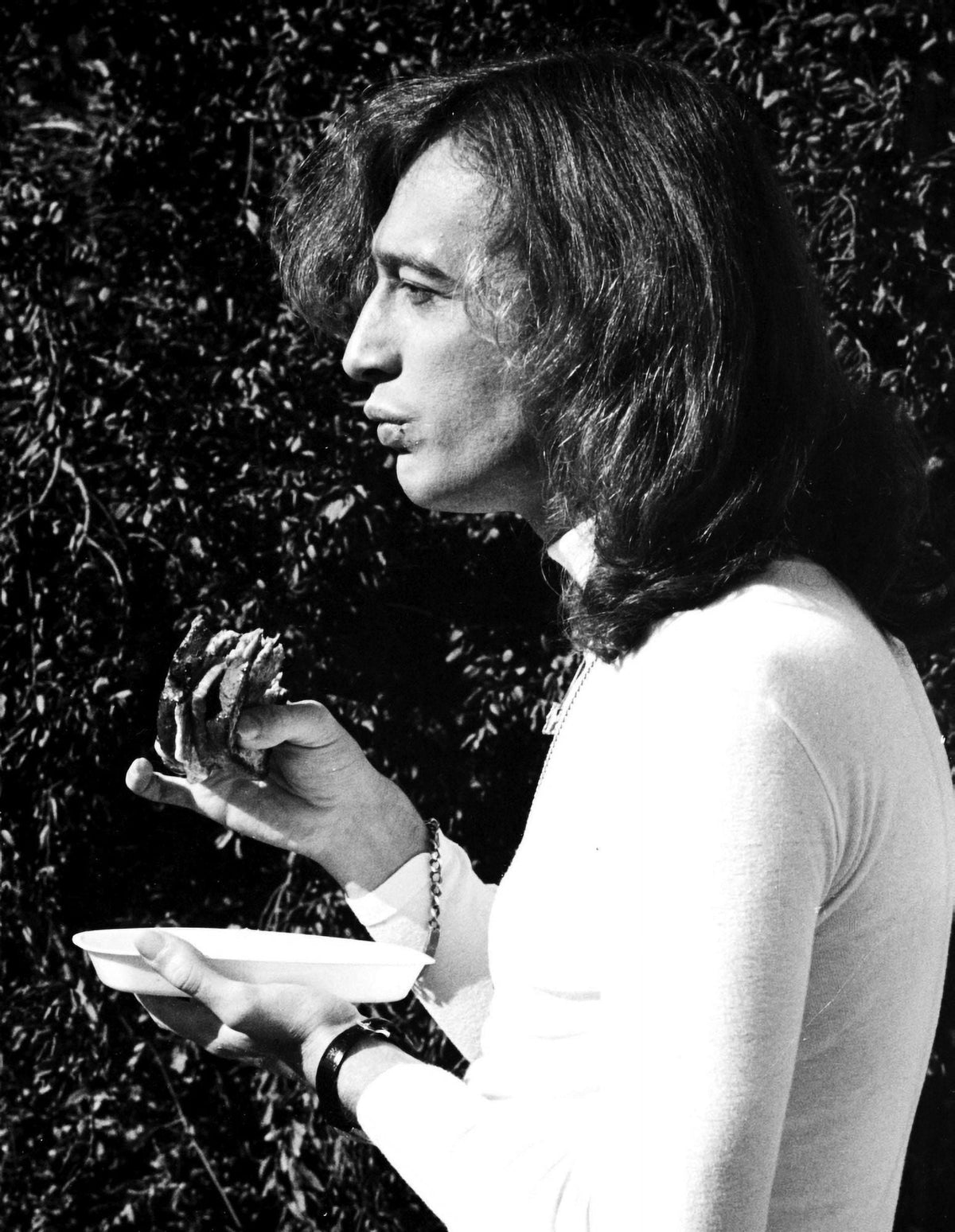 Robin Gibb dining photo print capturing an iconic moment.