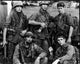Black and white photo print of Charlie Sheen, Tom Berenger, Willem Dafoe, Kevin Dillon, and Francesco Quinn in Platoon.