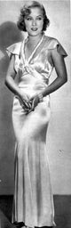 Fay Wray posed in glossy dress photo print available in multiple sizes.