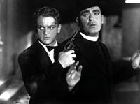 Angels With Dirty Faces movie photo print featuring James Cagney and Pat O'Brien held at gunpoint.