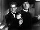 Angels With Dirty Faces movie photo print featuring James Cagney and Pat O'Brien held at gunpoint.