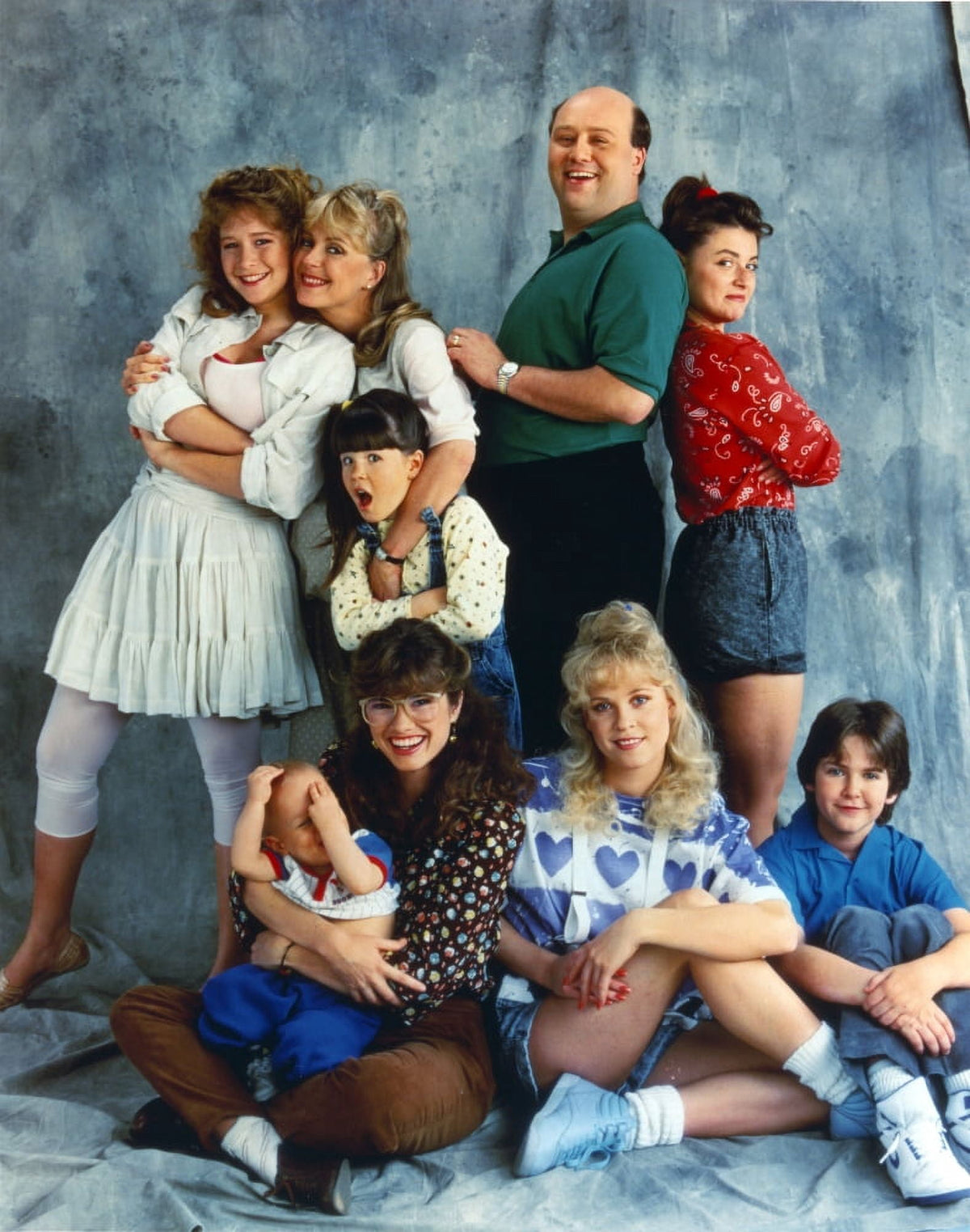 Group photo print of the cast from 'Just The Ten Of Us' TV show.