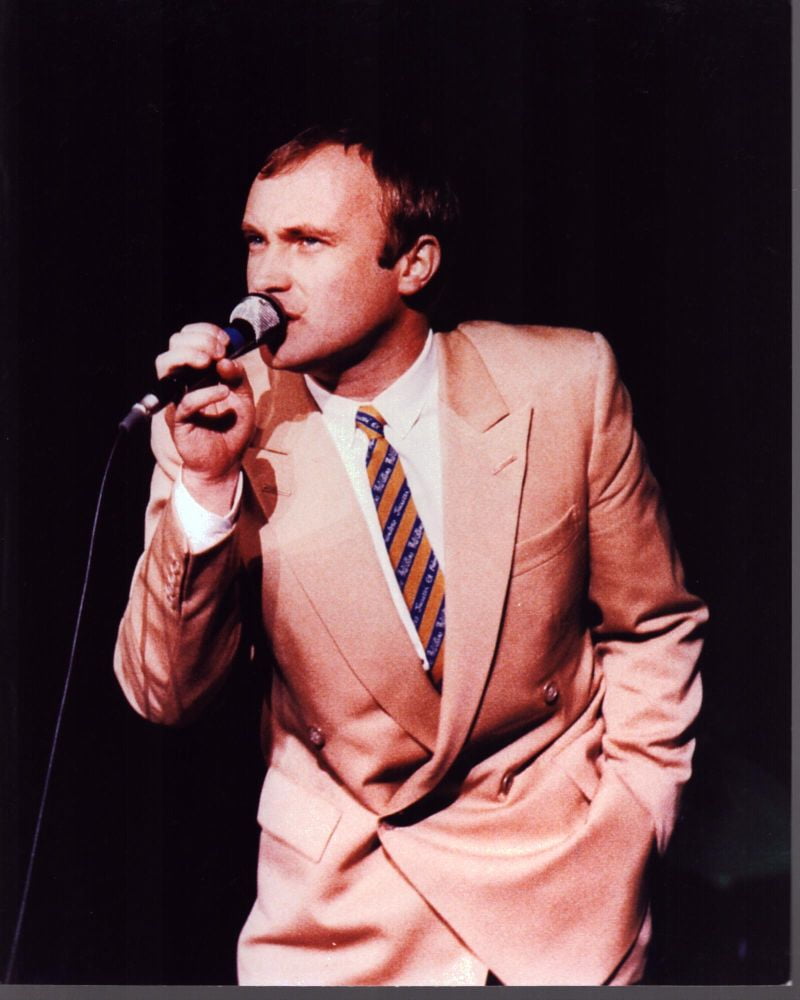 Phil Collins on stage photo print in tan suit