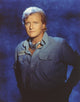 Rutger Hauer posed in denim jacket photo print, classic film memorabilia.