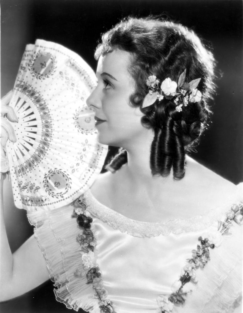 Janet Gaynor side view portrait photo print with fan.