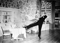 Fred Astaire and Ginger Rogers dancing photo print capturing classic Hollywood elegance.
