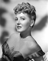 Jean Arthur portrait photo print in a slightly reclining pose.