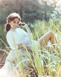 Dawn Wells photo print in a white sweater, capturing vintage charm.
