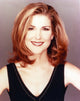 Close-up portrait photo print of Peri Gilpin smiling.