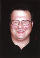 Wayne Knight close-up portrait photo print showcasing the actor's expressive features.