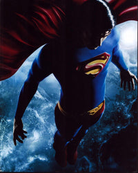 Brandon Routh Superman flying above Earth photo print