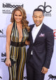 Chrissy Teigen and John Legend arriving at the Billboard Music Awards photo print.