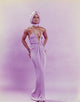 Lola Falana posing elegantly in a white dress photo print.