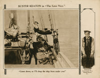 The Love Nest movie lobby card featuring Buster Keaton with axe, 1923.
