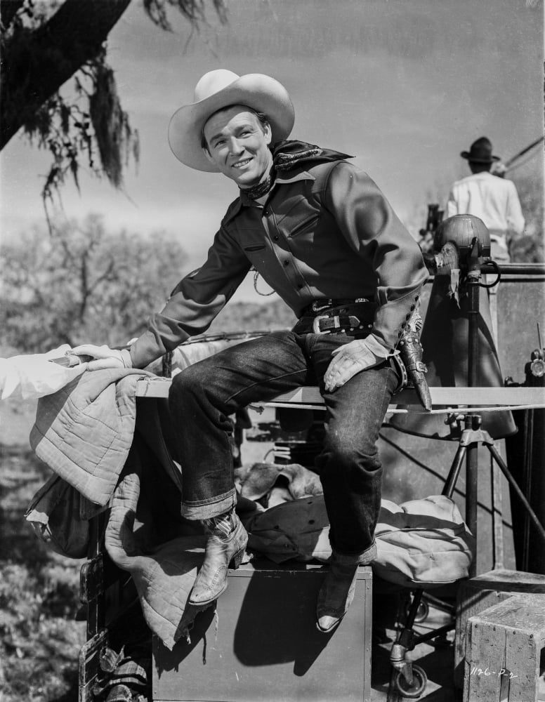 Roy Rogers seated in cowboy attire photo print