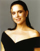 Polly Draper smiling portrait photo print wearing black dress