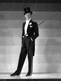 Fred Astaire posing in a black suit and top hat black and white photo print.