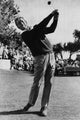 Dean Martin playing golf photo print capturing a classic celebrity moment.