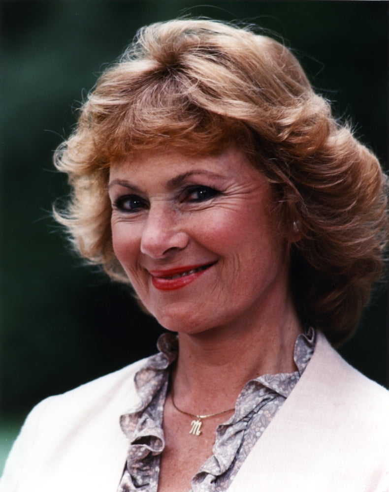 Close-up portrait photo print of Marion Ross in a white dress.