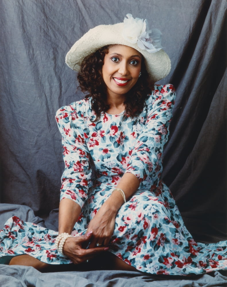 Telma Hopkins posed in floral dress and hat photo print.