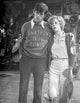 They Shoot Horses, Don't They? Black and White Photo Print featuring a man escorting a woman.