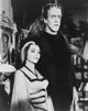 The Munsters Still Poster Print featuring classic television characters.