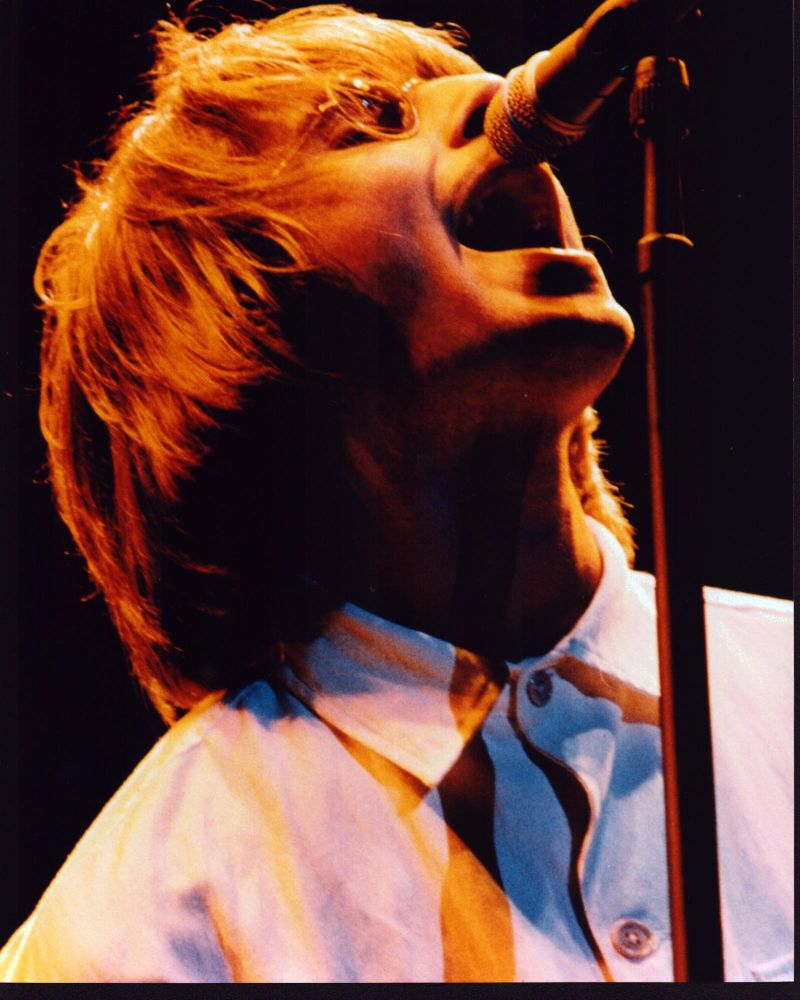 Liam Gallagher singing on stage photo print